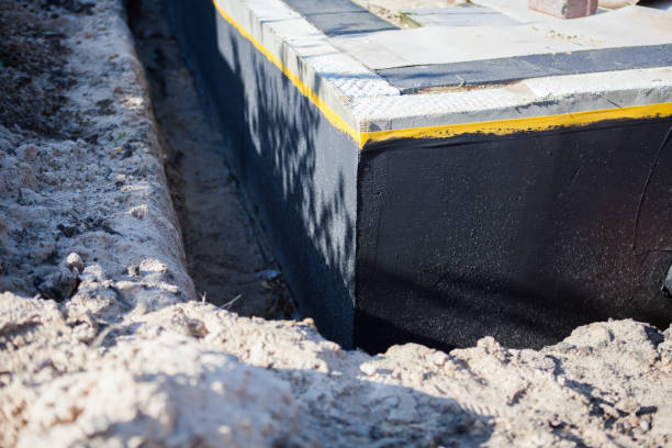 Professional Waterproofing technician working in Jonesboro, GA